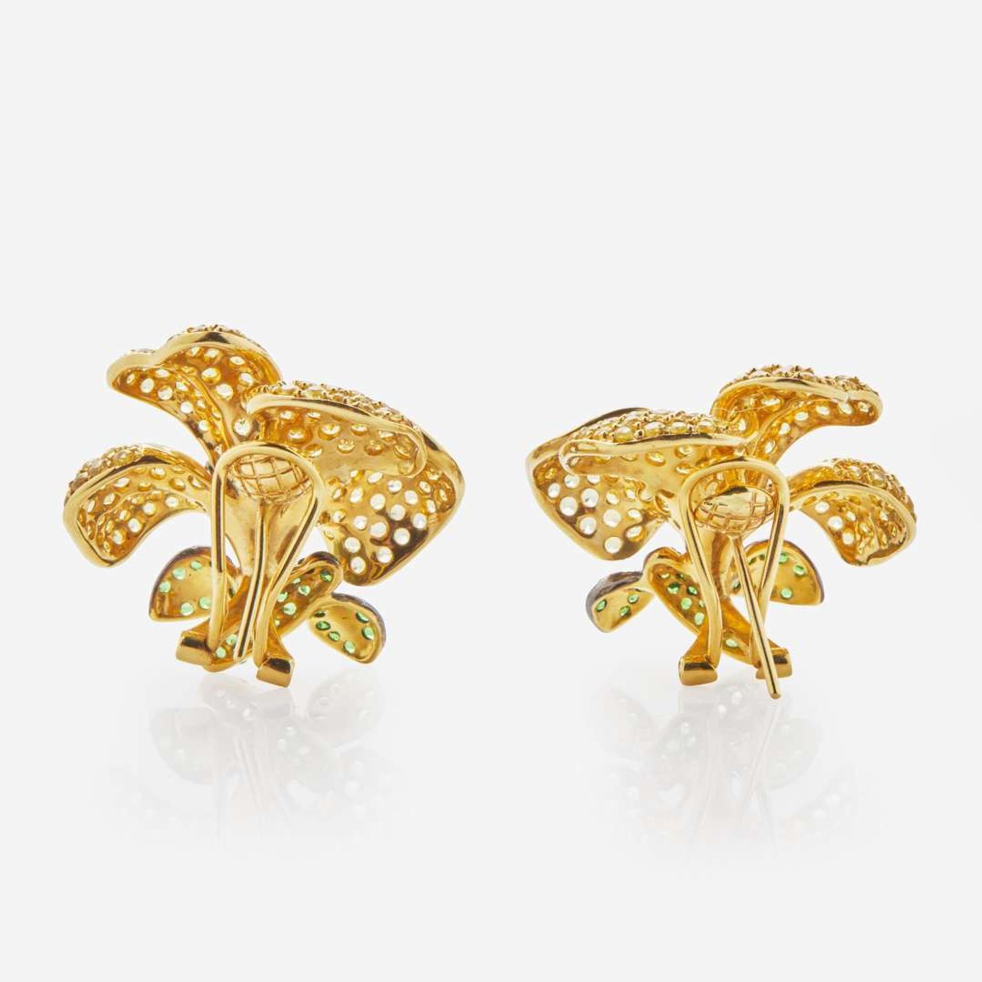 A Pair of Yellow Topaz, Diamond and Emerald Flower Earrings