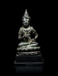 A Small Indonesian Bronze Figure of a Female Retinue