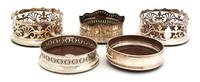A Group of Eight Silver Plate Bottle Coasters Diameter of largest 6 inches. — 19TH/20TH CENTURY