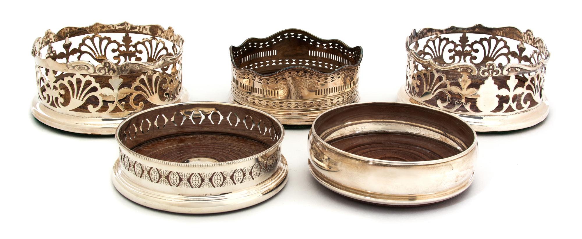 A Group of Eight Silver Plate Bottle Coasters Diameter of largest 6 inches. — 19TH/20TH CENTURY