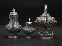 An American Repousse Silver Six-Piece Tea and Coffee Service