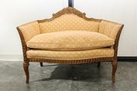An Italian Walnut Settee. Height 35 inches.