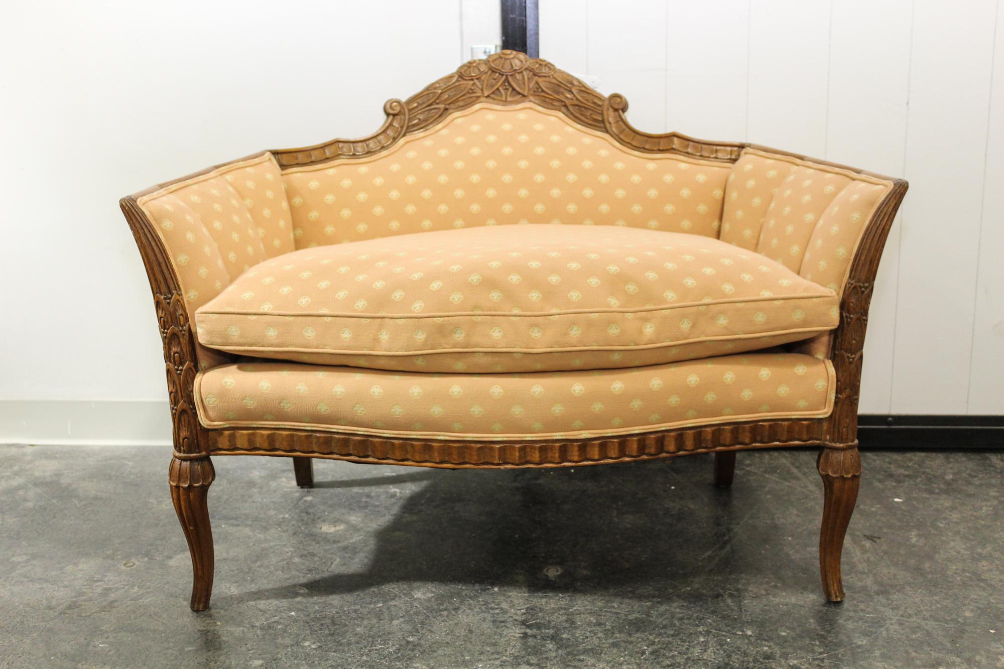 An Italian Walnut Settee. Height 35 inches.