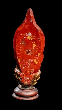 A Gilt and Red Lacquered Wood Figure of Buddha