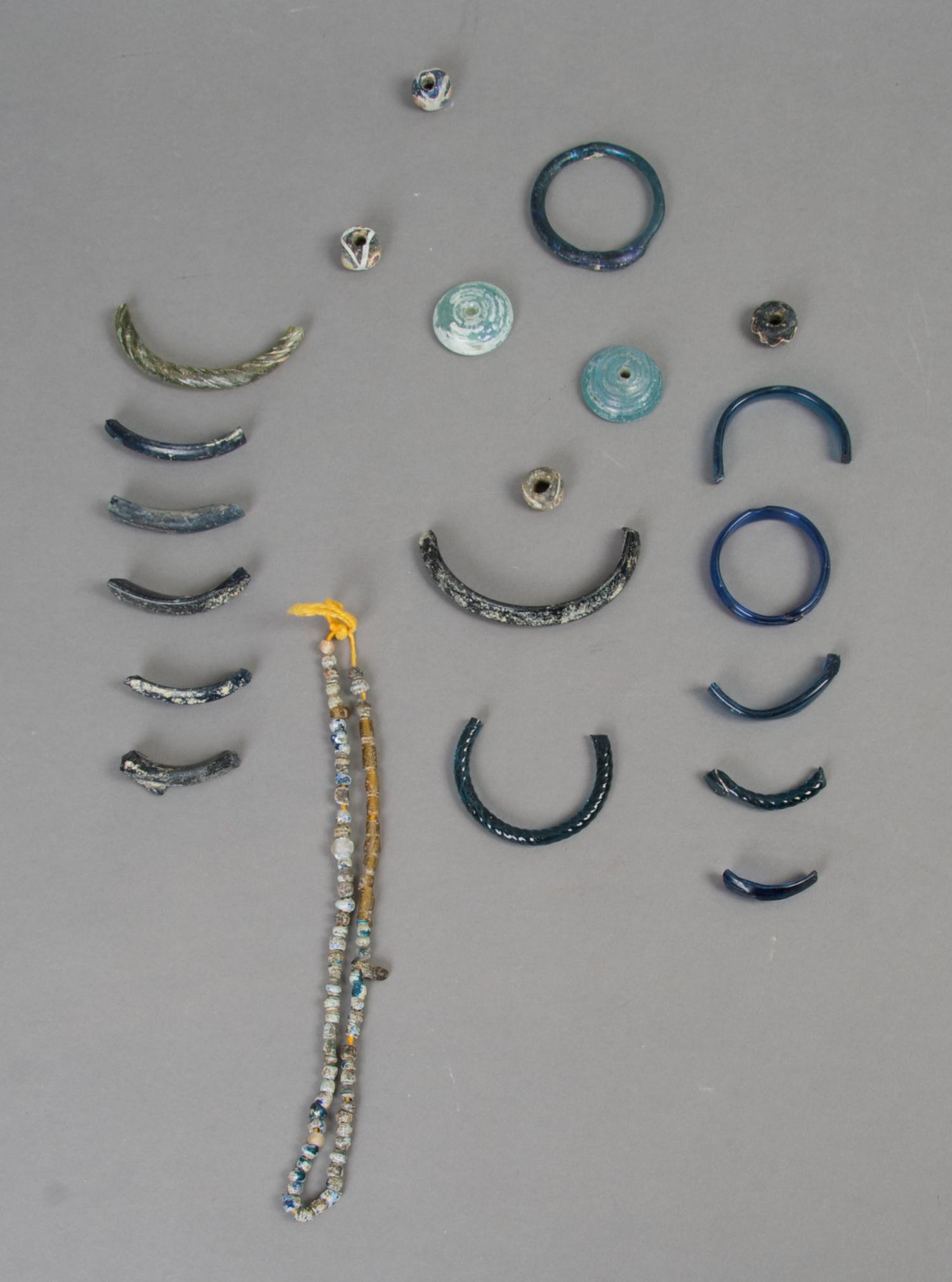 A Collection of Roman Glass Artifacts, Length of first approximately 14 inches.