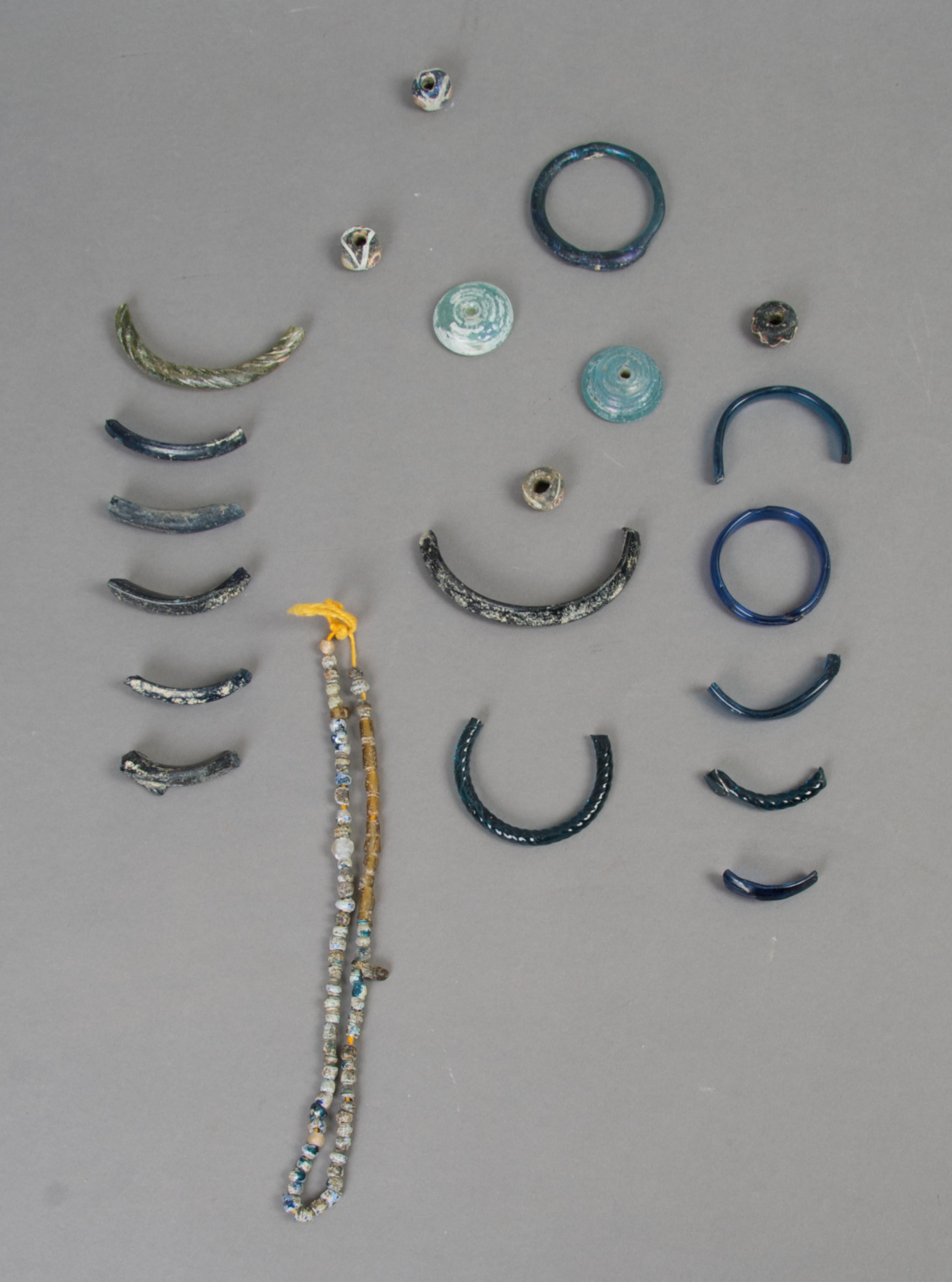 A Collection of Roman Glass Artifacts, Length of first approximately 14 inches.