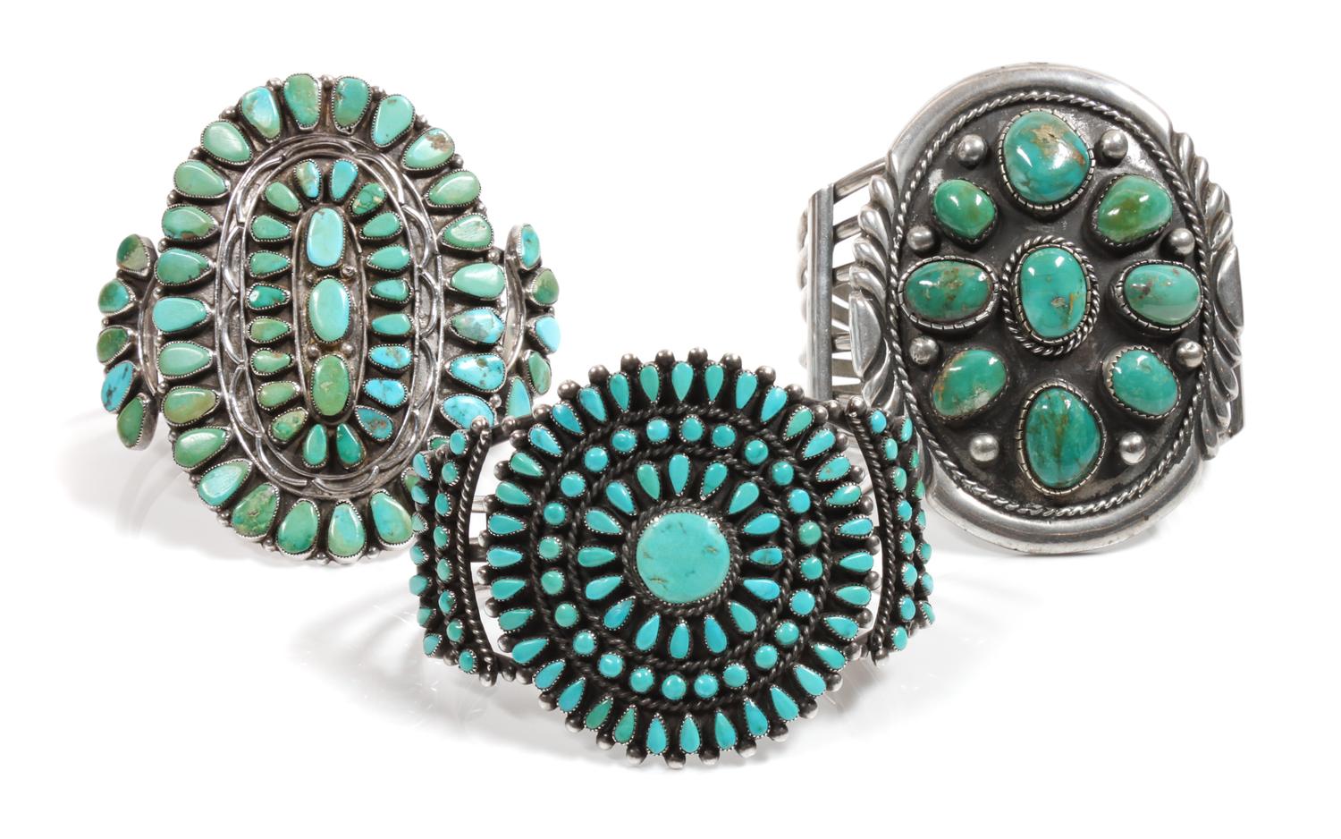 Three Southwestern Silver and Turquoise Cluster Bracelets Length of one 5 3/4 x opening 1 1/4 x width 3 inches