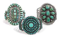 Three Southwestern Silver and Turquoise Cluster Bracelets Length of one 5 3/4 x opening 1 1/4 x width 3 inches