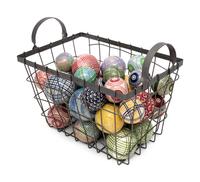 A Collection of English Polychrome Glazed Carpet Balls in a Wirework Basket