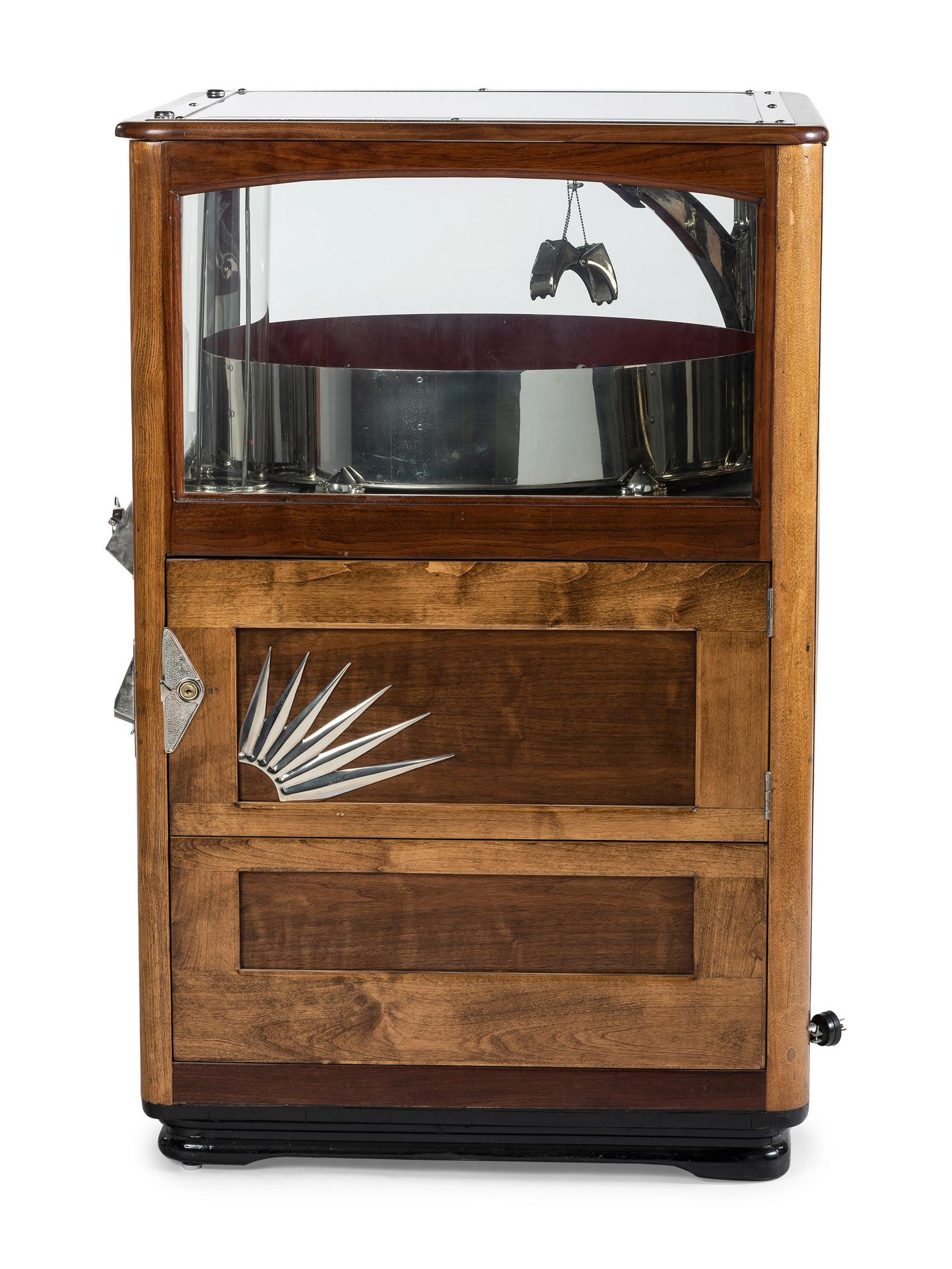 An Exhibit Supply Co. Novelty Candy Vender Claw Machine