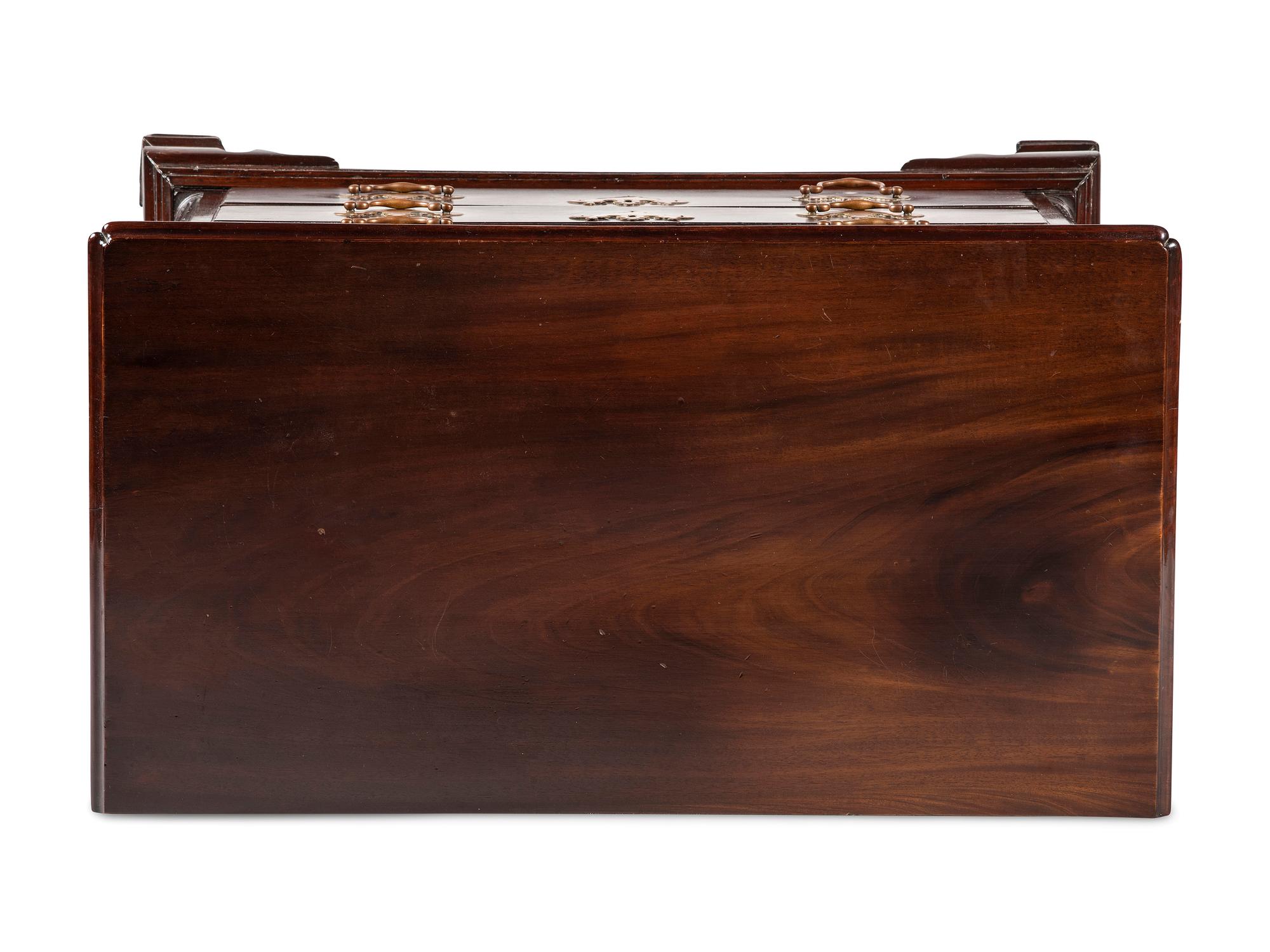 A Chippendale Carved and Figured Mahogany Chest of Drawers