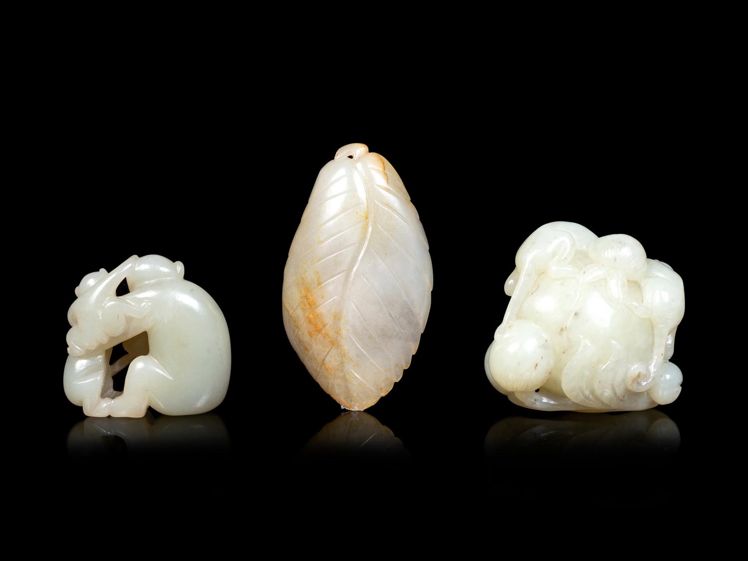 Three Chinese Celadon Jade Carvings of Monkeys