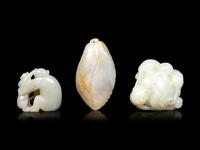 Three Chinese Celadon Jade Carvings of Monkeys