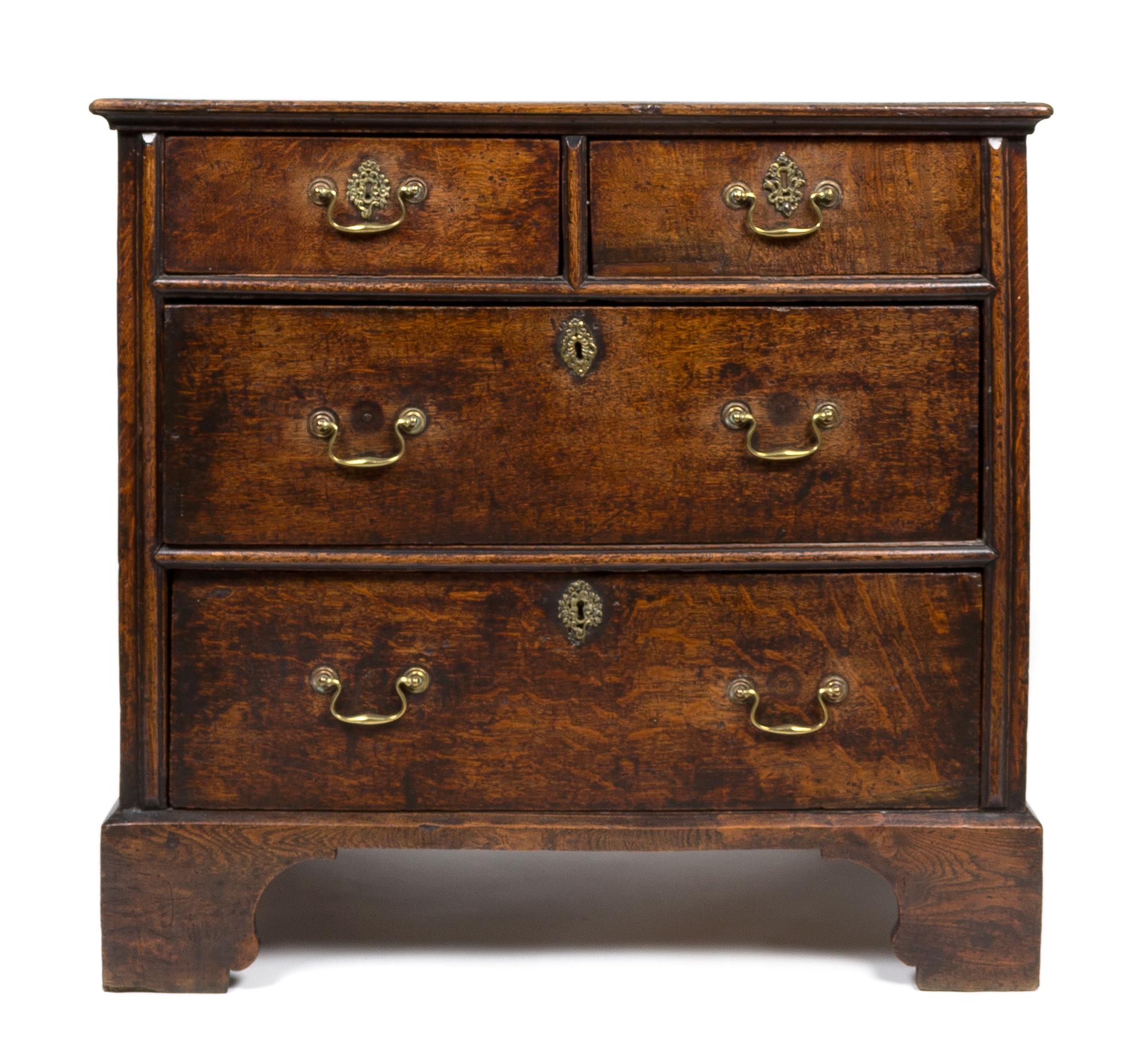 An English Chippendale Oak Four Drawer Chest of Drawers Height 33 x width 34 x depth 21 inches. — CIRCA 1770