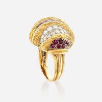 A gold, diamond, and ruby ring