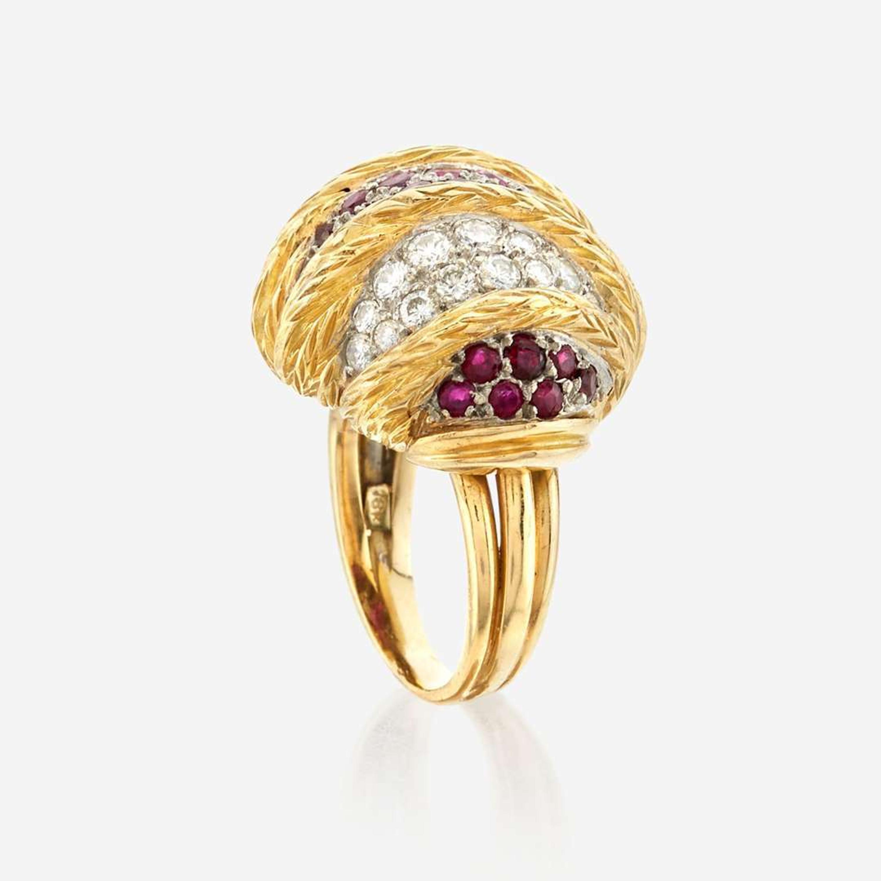 A gold, diamond, and ruby ring
