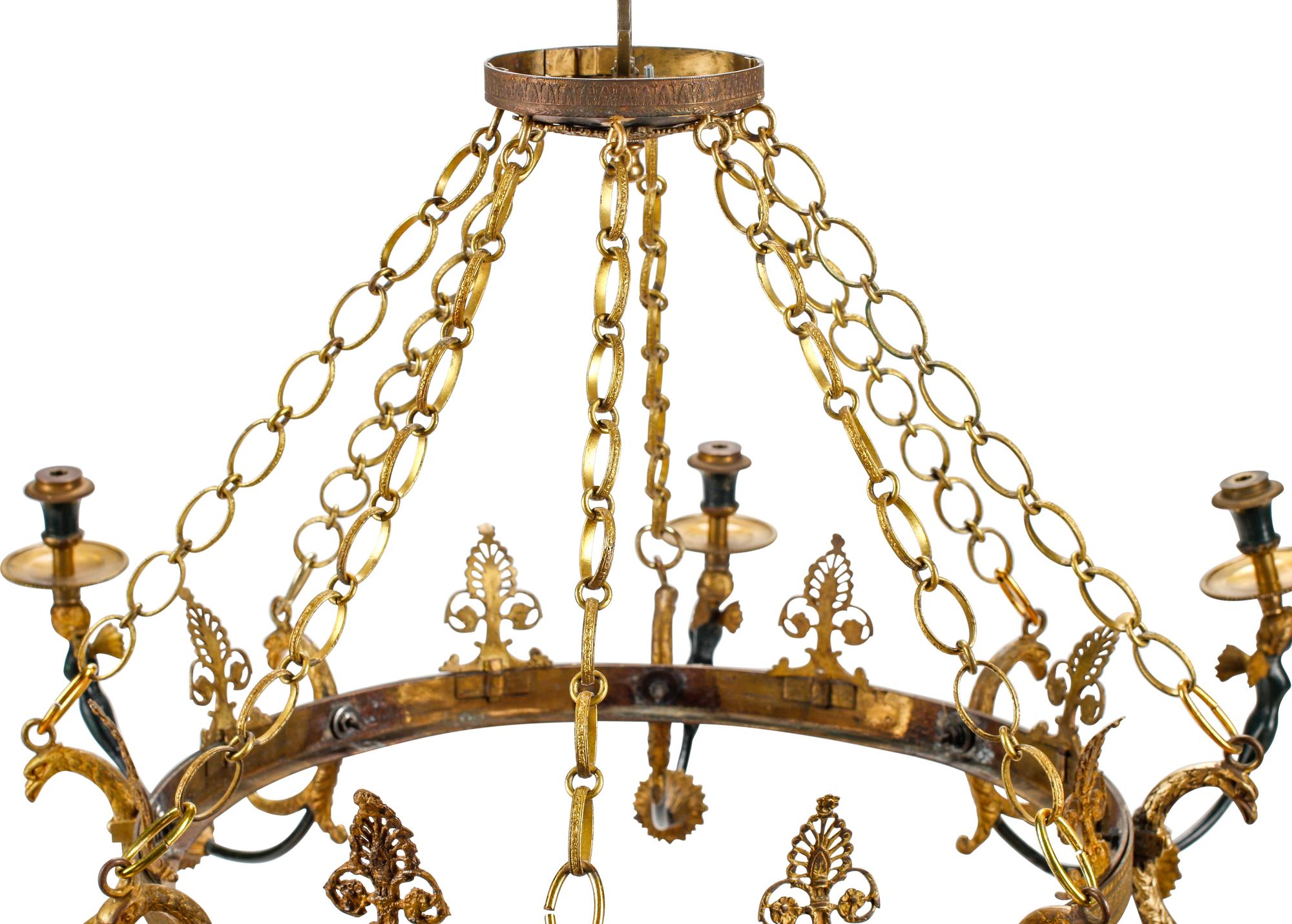 A French Neoclassical Style Gilt and Patinated Metal Eight-Light Chandelier