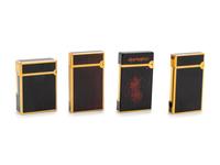 A Group of Four St. DuPont Lighters