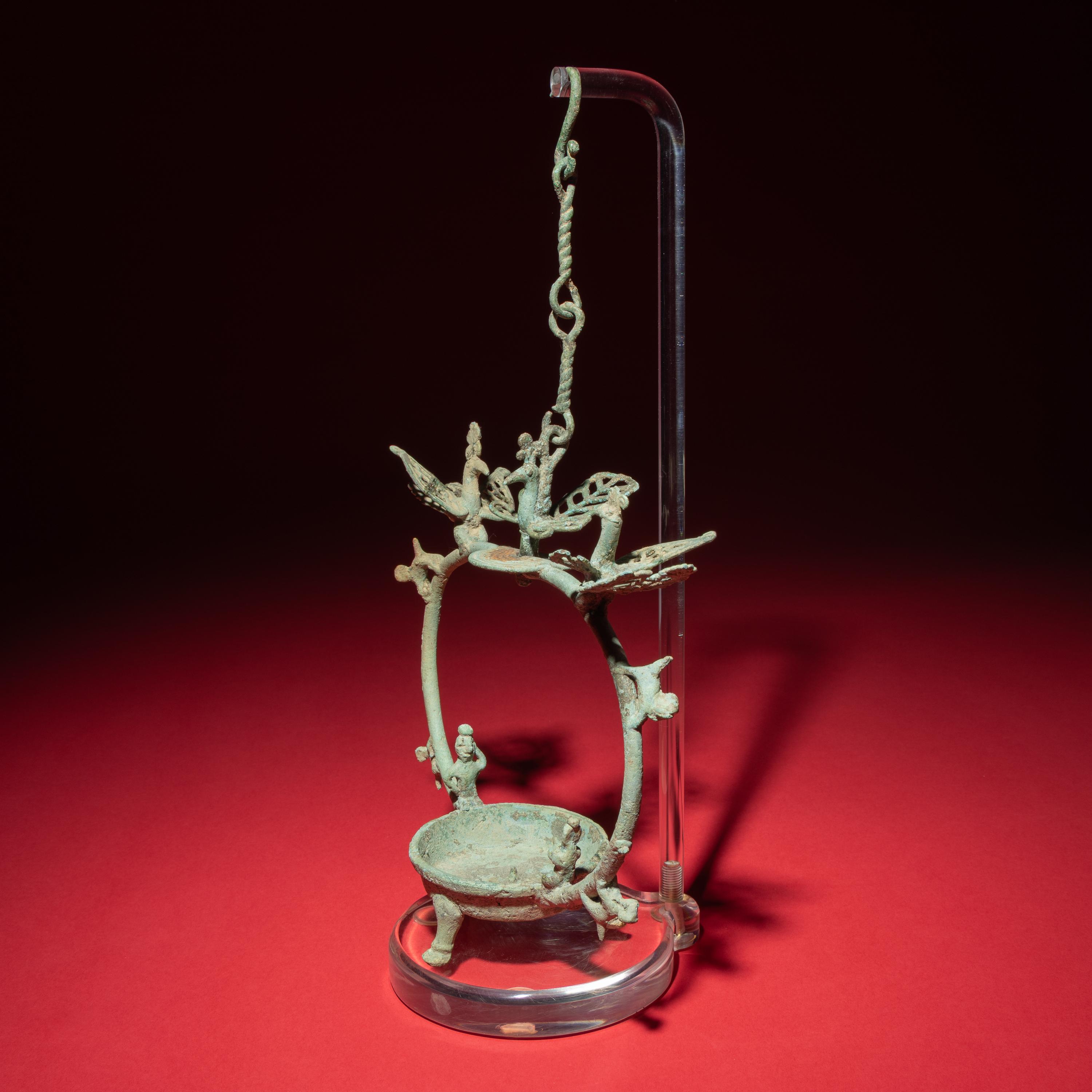 A Chinese Bronze 'Phoenix and Immortal' Hanging Oil Lamp, Eastern Han Dynasty — 東漢 青銅龍鳳神人懸燈