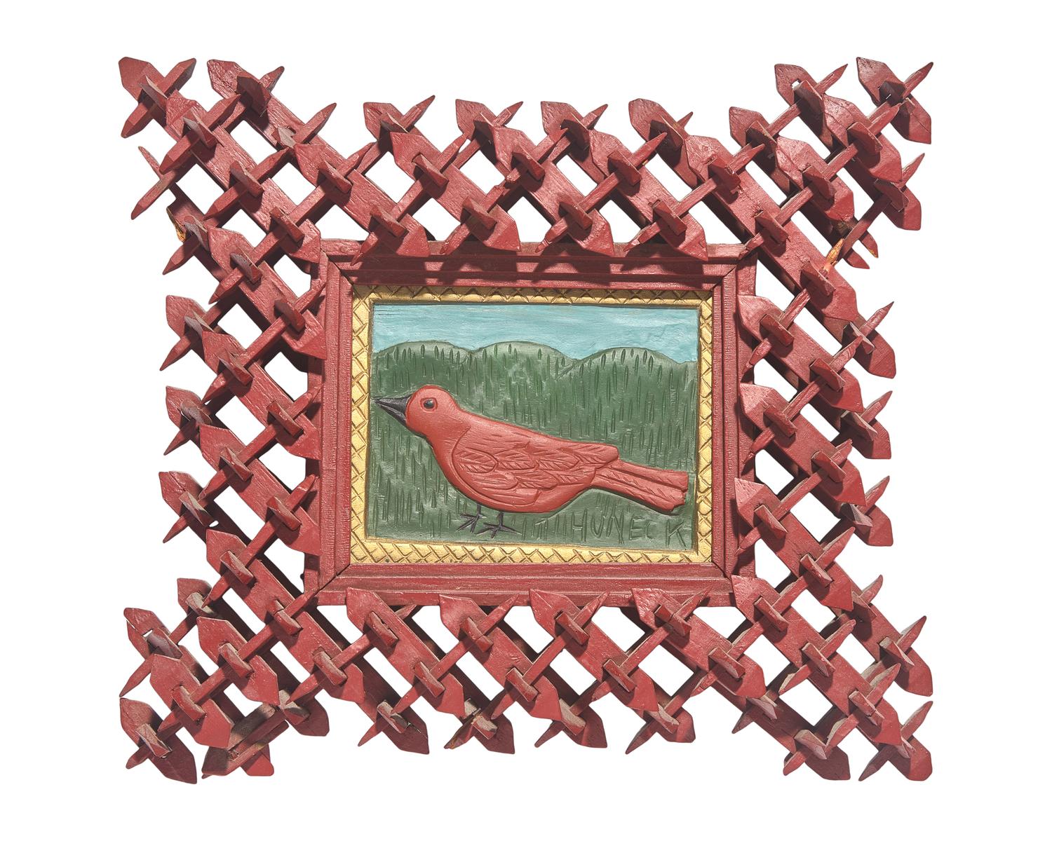 Stephen Huneck (1948-2010), A Carved and Painted Wood Plaque of a Bird in Painted Tramp Art Frame