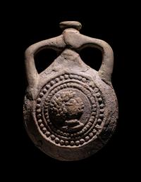 A Coptic Terracotta Pilgrim Flask with Saint Menas and Inscription