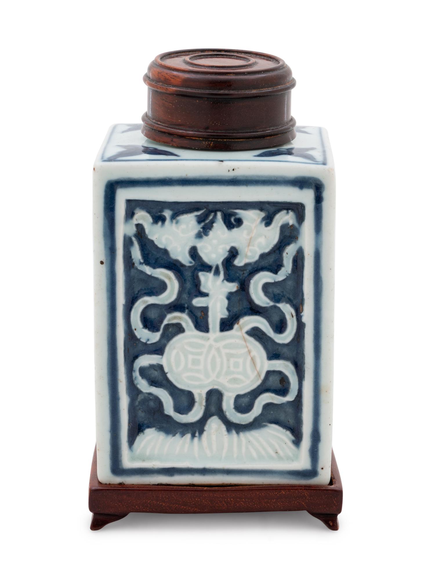 A Chinese White Slip Decorated Blue Ground Rectangular Tea Caddy