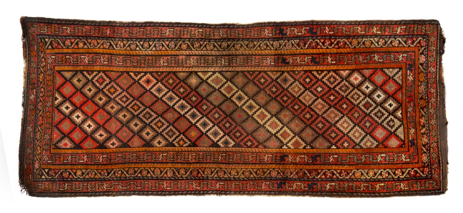 A Caucasian Wool Runner 7 feet 3 inches x 3 feet.