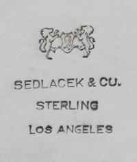 An American Hammered Silver Trophy, Sedlacek & Co., Los Angeles, CA, 20th Century, the undulating rim over an ovoid basin, inscribed Op
