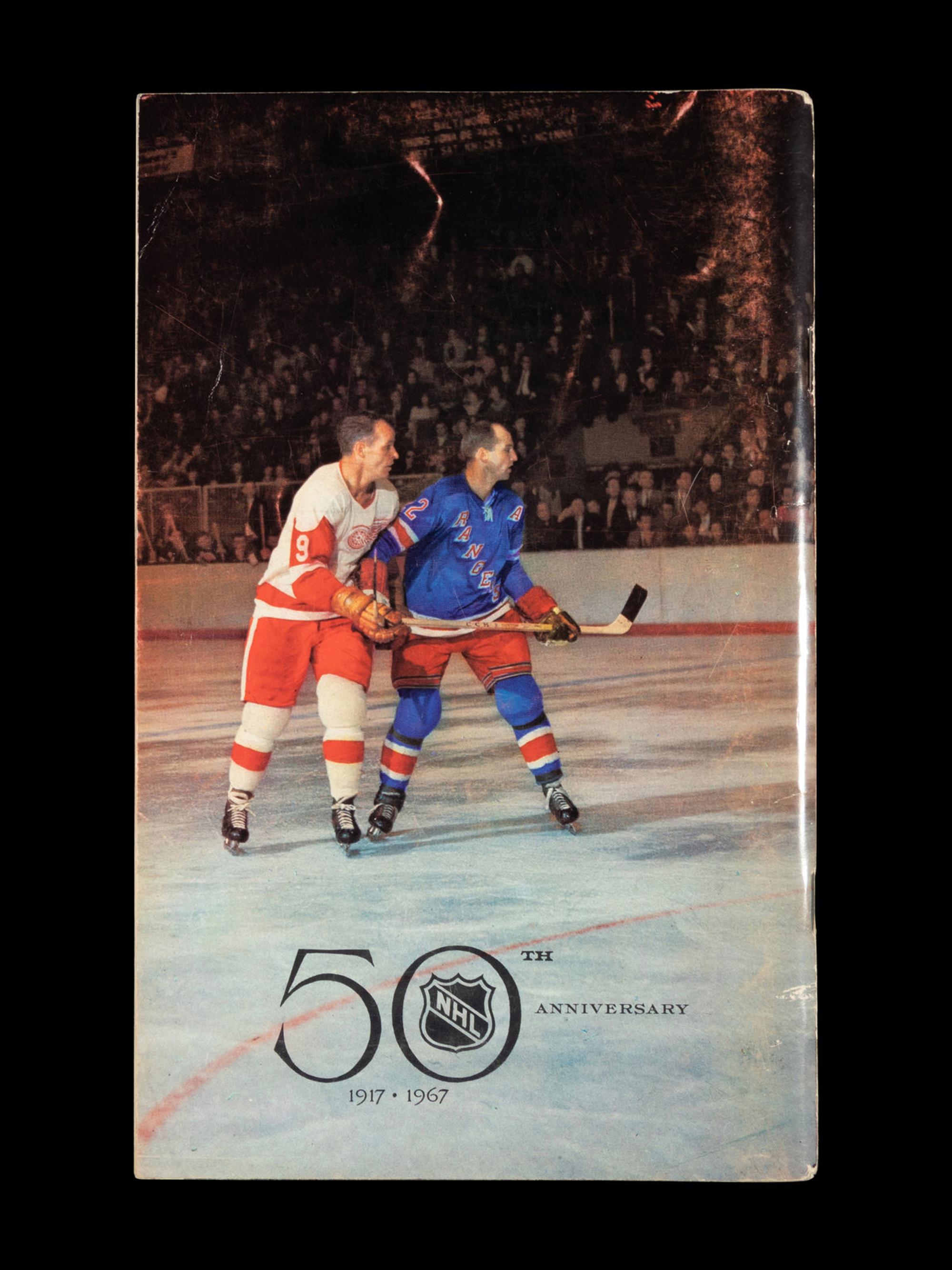 A Group of 16 1960s - 1980s New York Rangers Blue Book Media Guides,