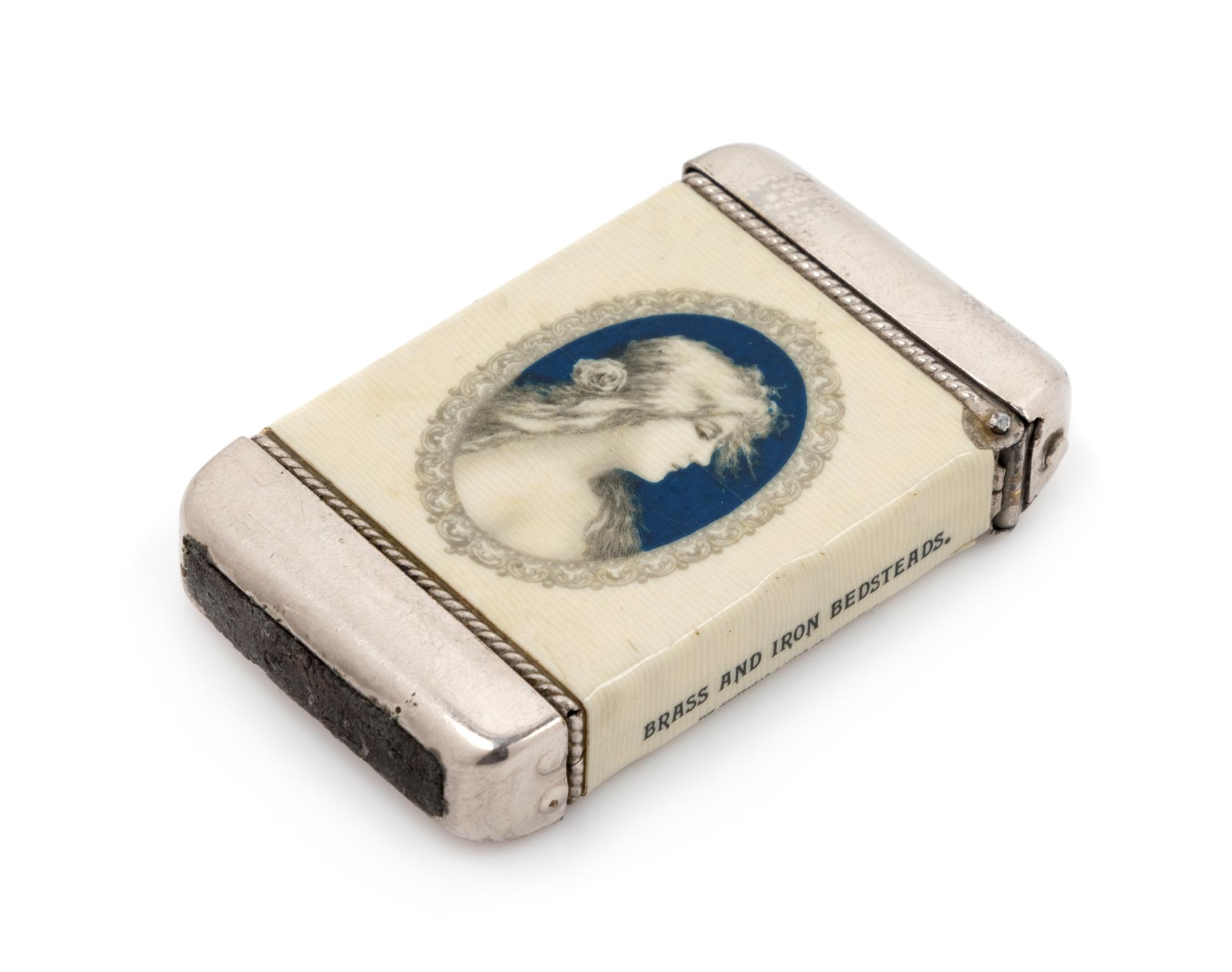 An American Celluloid and Mixed Metal Advertisement Match Safe Height 2 3/8 inches. — LATE 19TH/EARLY 20TH CENTURY
