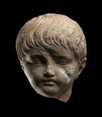 A Roman Marble Portrait Head of a Boy
