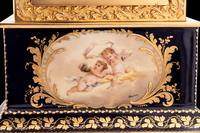 A Royal Vienna Porcelain Mounted Gilt Bronze Clock, Couaillet