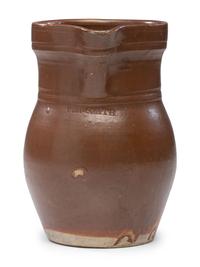 A P.H. Smith Albany Slip Stoneware Pitcher