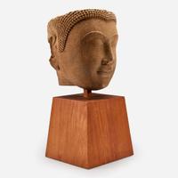 A large Thai carved sandstone head of a Buddha泰国石雕佛首
