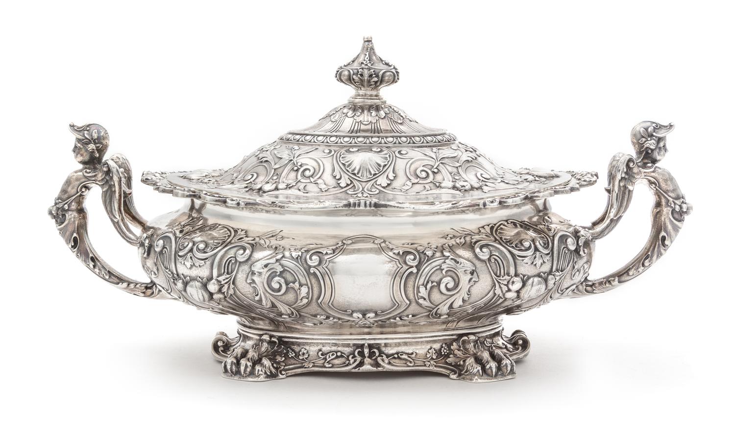 An American Silver Covered Dish, Gorham Mfg. Co., Providence, RI, Circa 1915, the cover with an urn form finial, the body with twin put