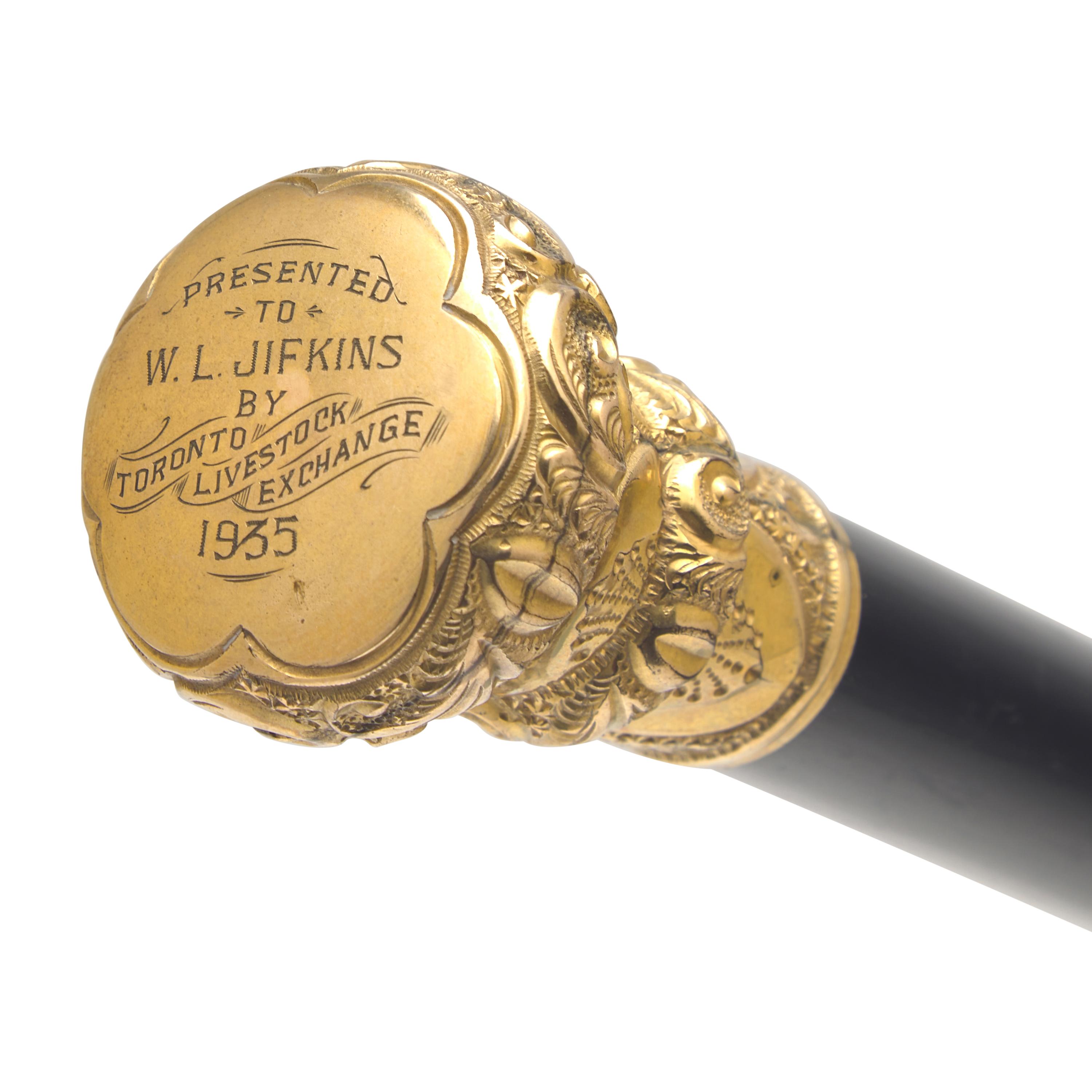 A Gold-Mounted and Ebonized Walking Stick