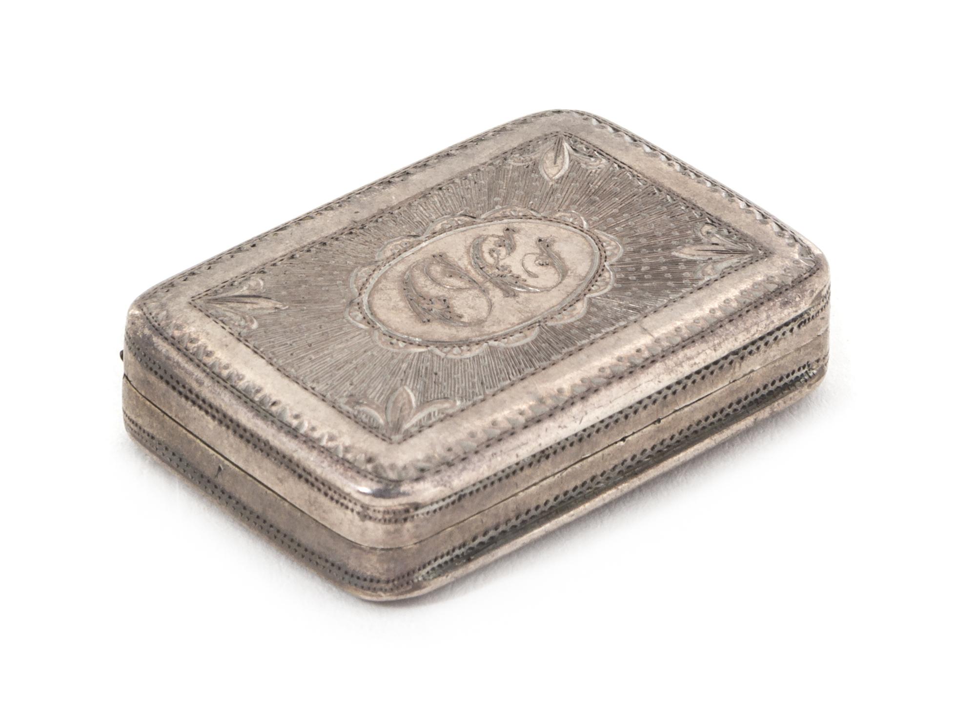 A George III Silver Vinaigrette, John Shaw, Birmingham, 1791, of rectangular form, the engine turned ground centered with an engraved c