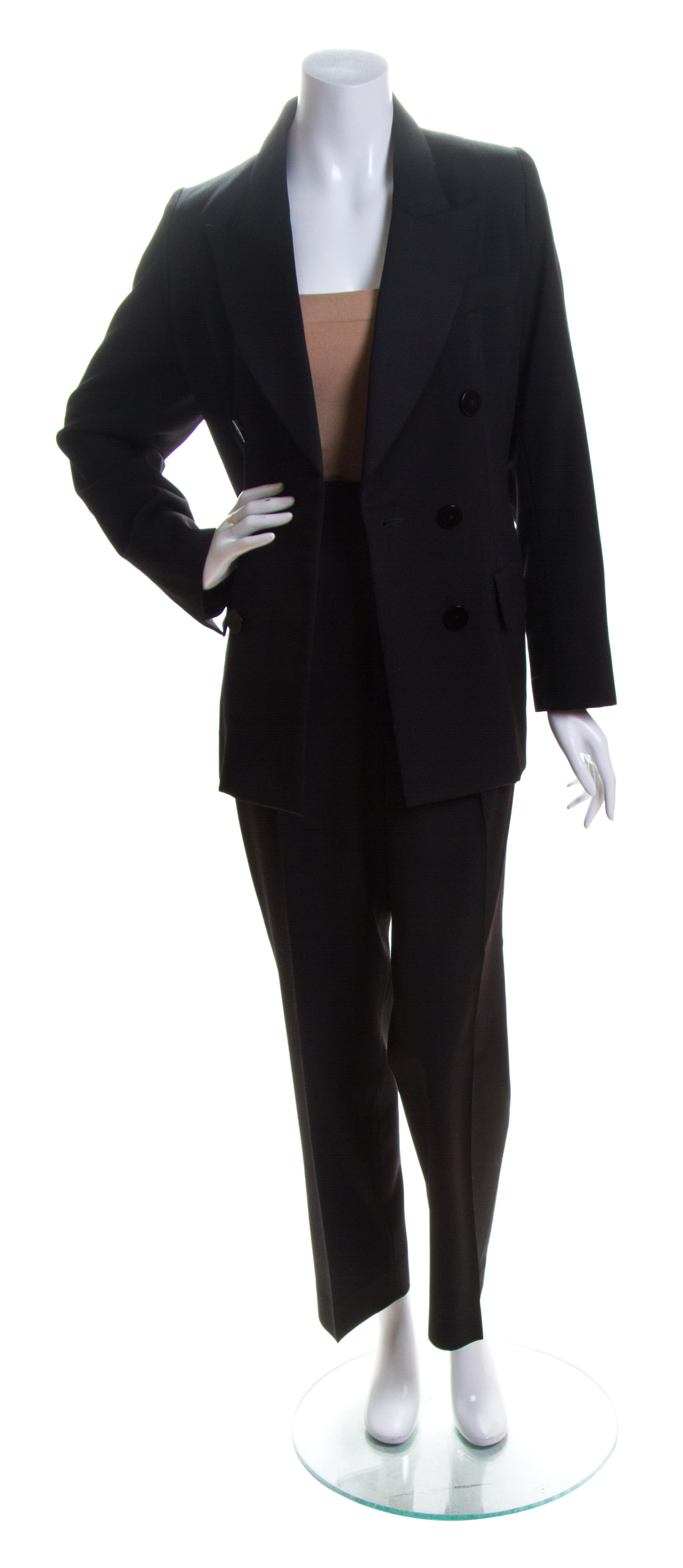 An Yves Saint Laurent Black Wool Tuxedo, Jacket size 42.