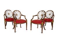 A Set of Eight George III Style Mahogany Wheel Back Armchairs.