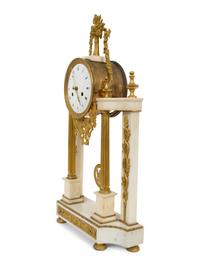 A French Gilt Bronze and White Marble Mantel Clock