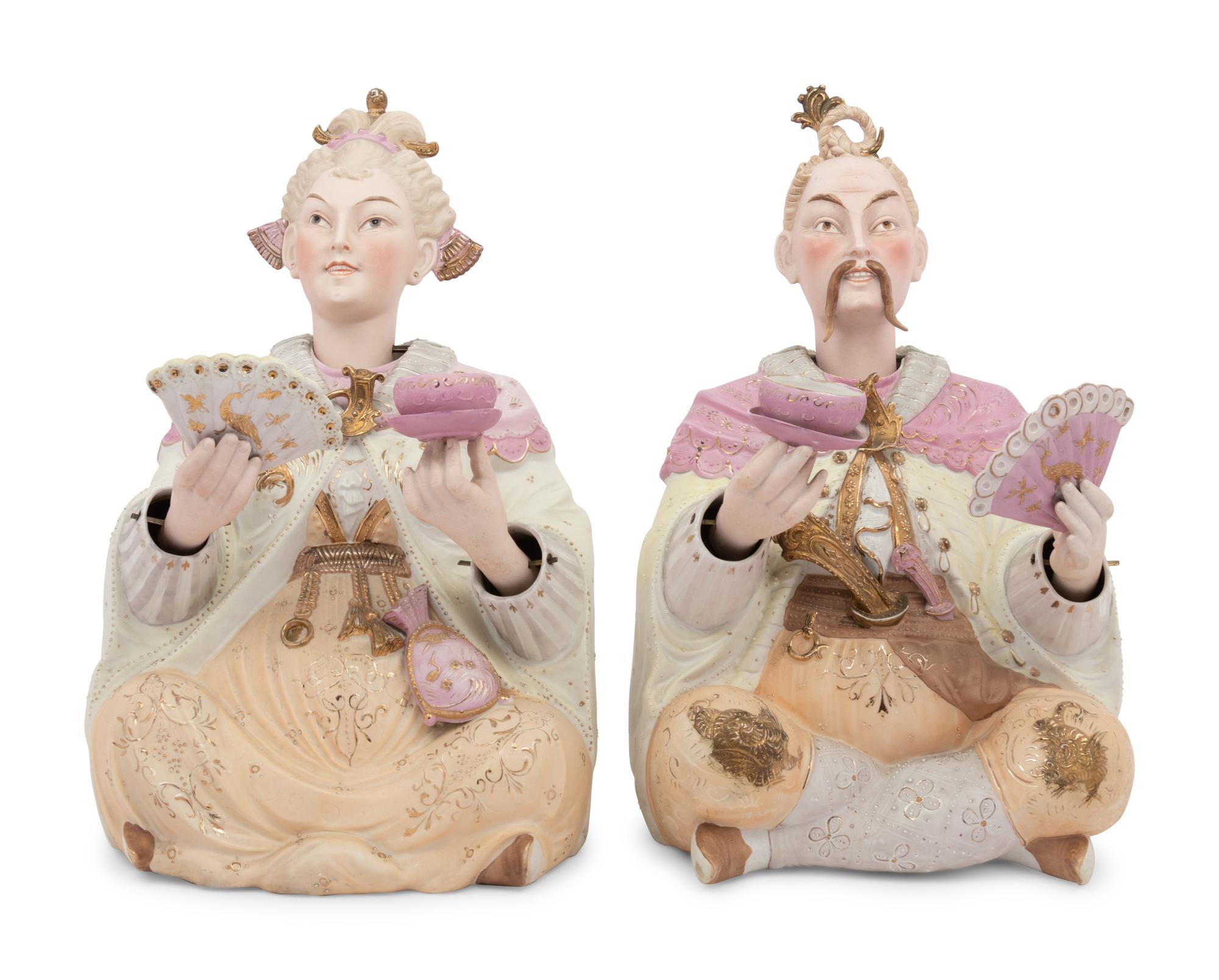 A Pair of German Porcelain “Nodder” Figures