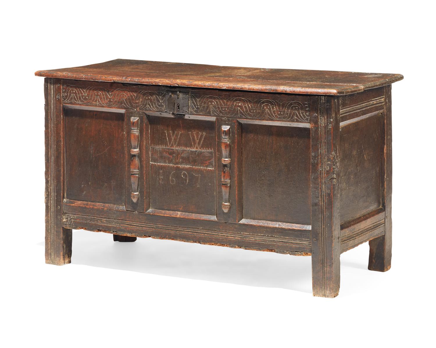A William & Mary carved oak coffer, dated "1697"