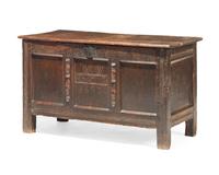 A William & Mary carved oak coffer, dated "1697"