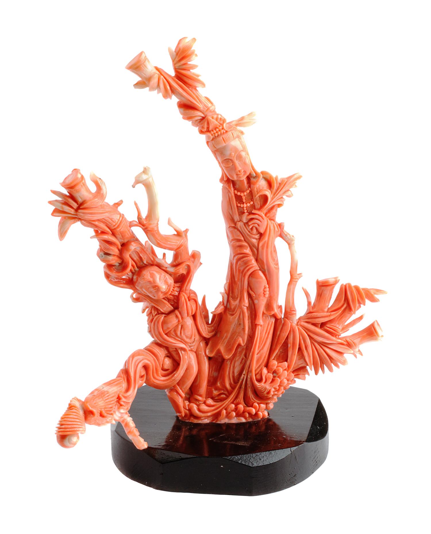 A Chinese Carved Coral Figure Height 8 inches.