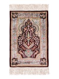 A Turkish Silk Prayer Rug