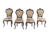A Set of Four Rococo Revival Carved Balloon-Back Side Chairs