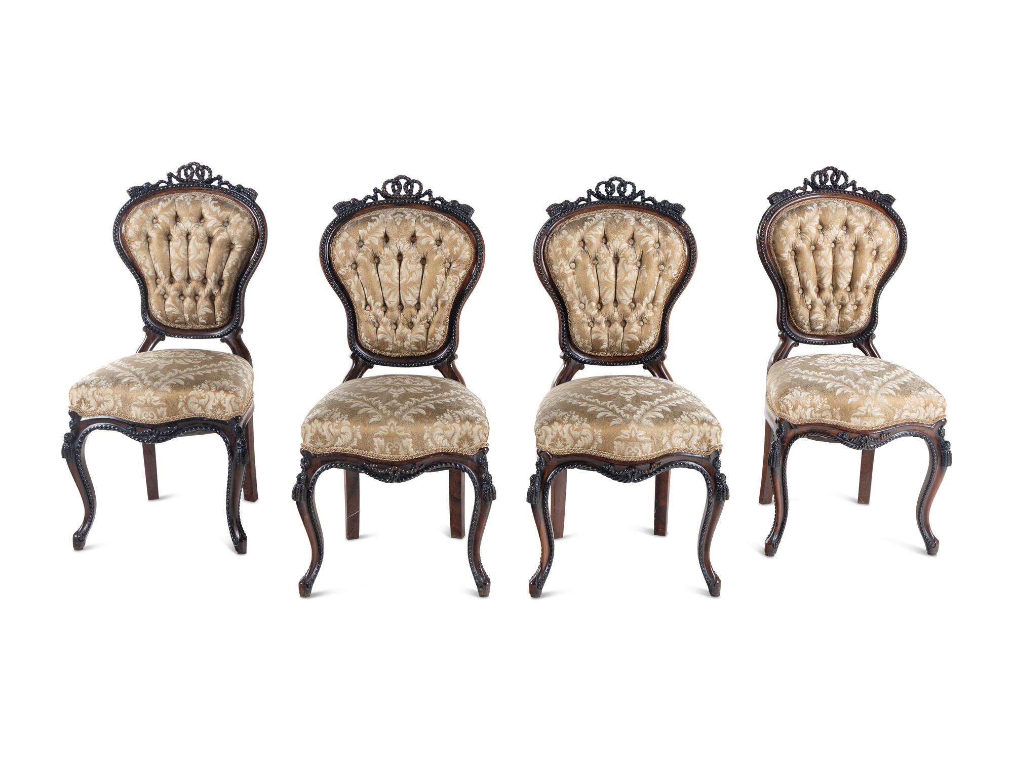 A Set of Four Rococo Revival Carved Balloon-Back Side Chairs