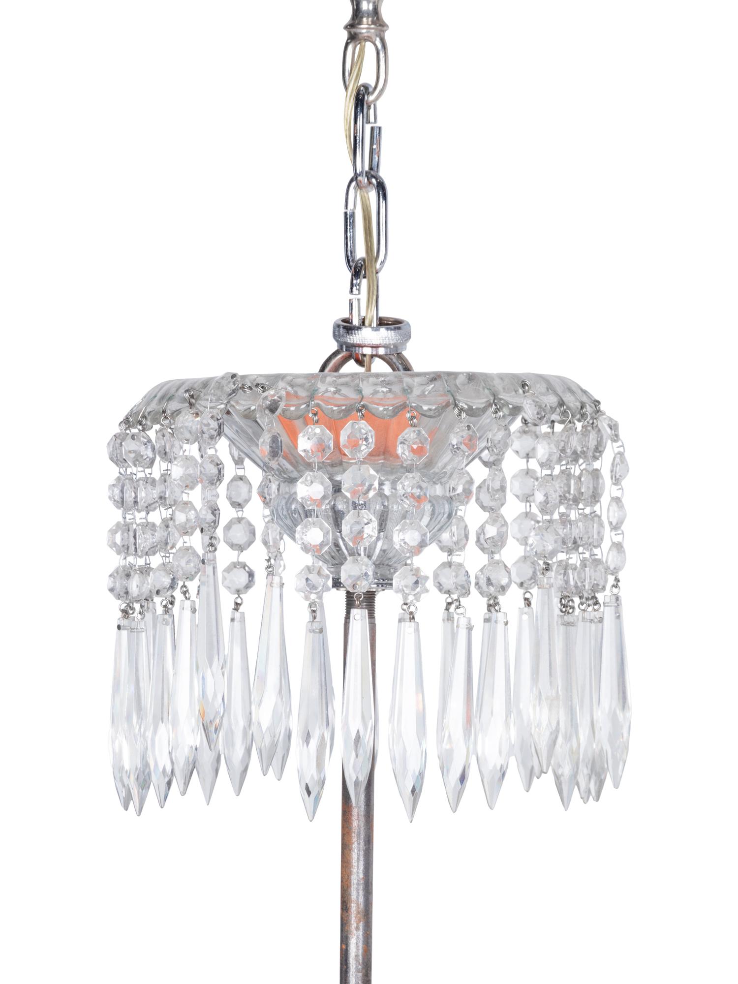A Pair of Cut Glass Sixteen-Light Chandeliers