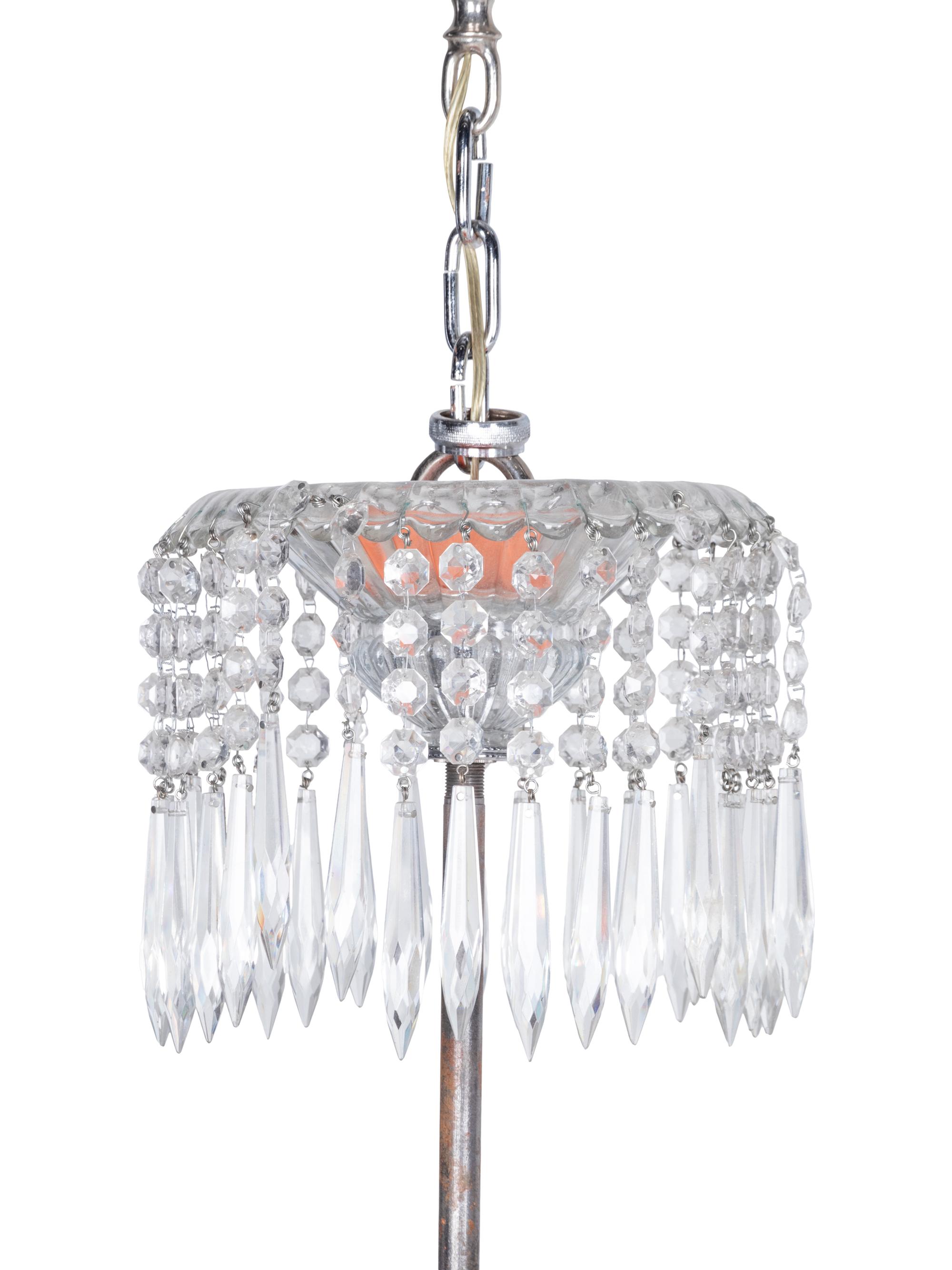 A Pair of Cut Glass Sixteen-Light Chandeliers