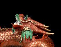 A Pair of Chinese Coral-Ground Gilt and Green Enameled Porcelain Dragons